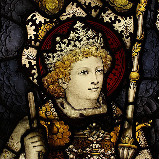 Stained glass artwork depicting a crowned figure with curly hair, holding a scepter and dressed in ornate, medieval-style clothing and jewelry—an elegant piece, often admired by newton ma dentist offices for its timeless beauty.